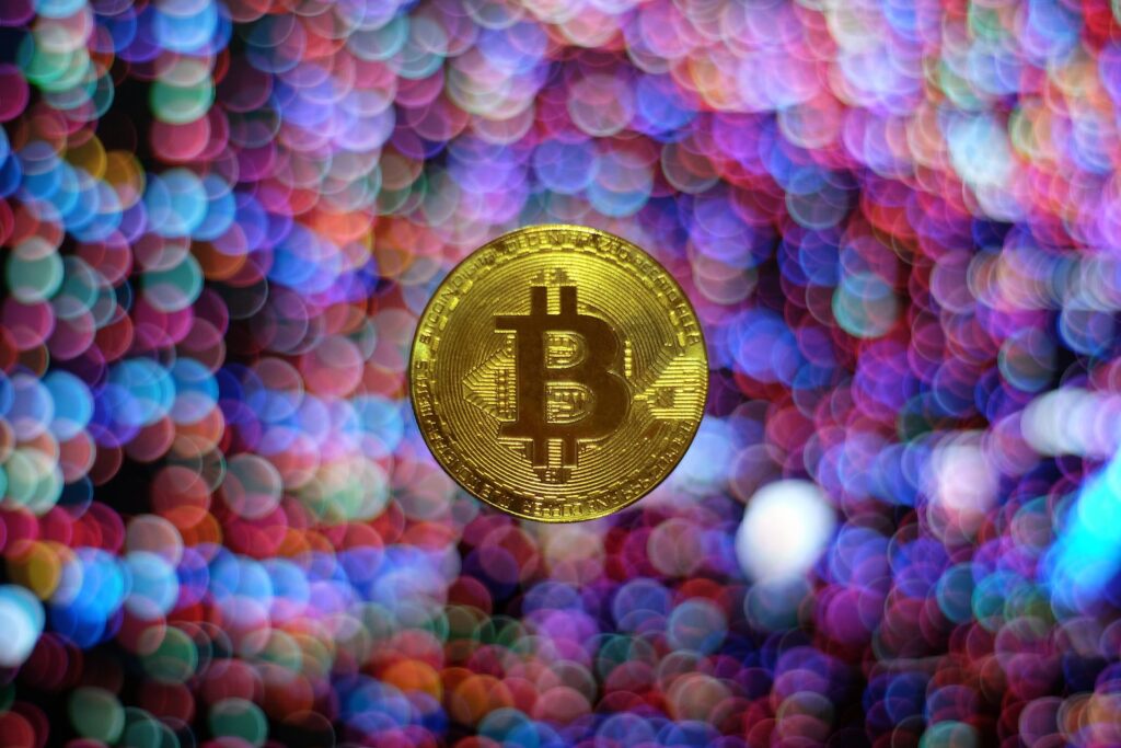 round gold-colored Bitcoin illustration